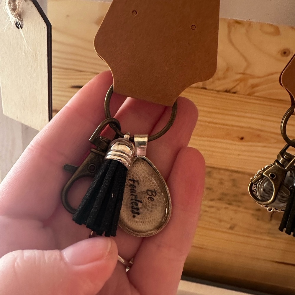 Silver and Black Keychain with Inspirational Message